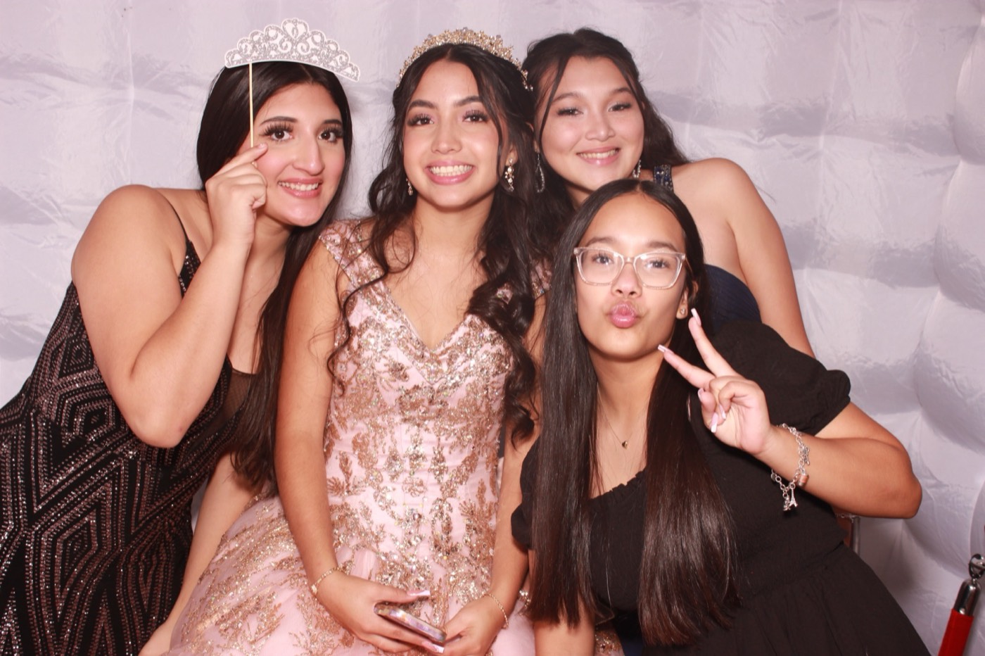 A quinceañera with her closest friends at a quince party in San Antonio