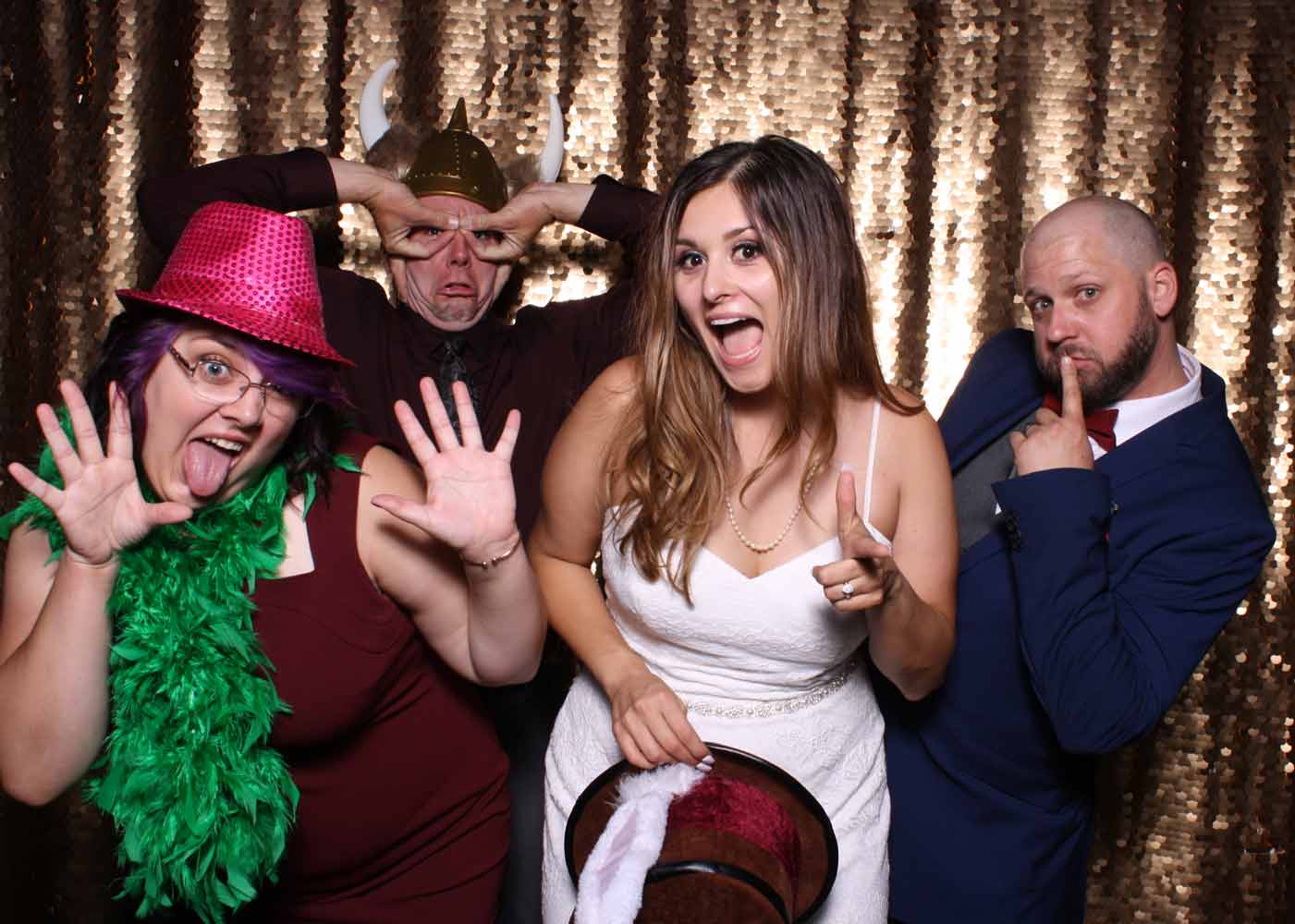Guests celebrating with a photo booth at a San Antonio event; Mr Booth provides fun, instant-print rentals for weddings and parties.